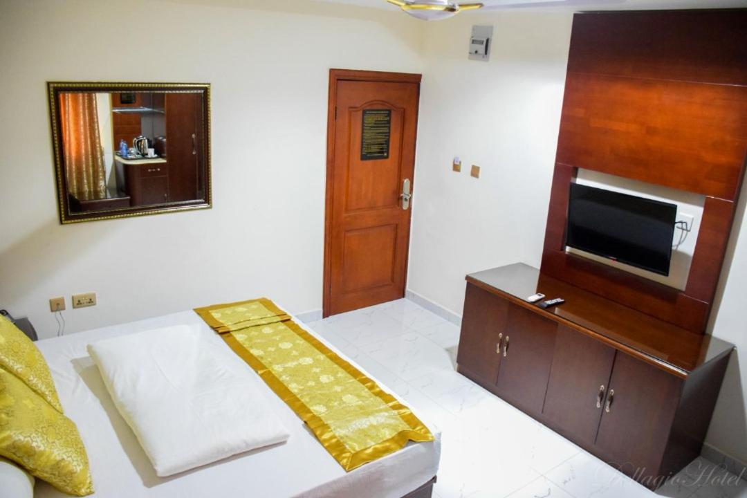 Dellagio Hotel Wa Bagian luar foto